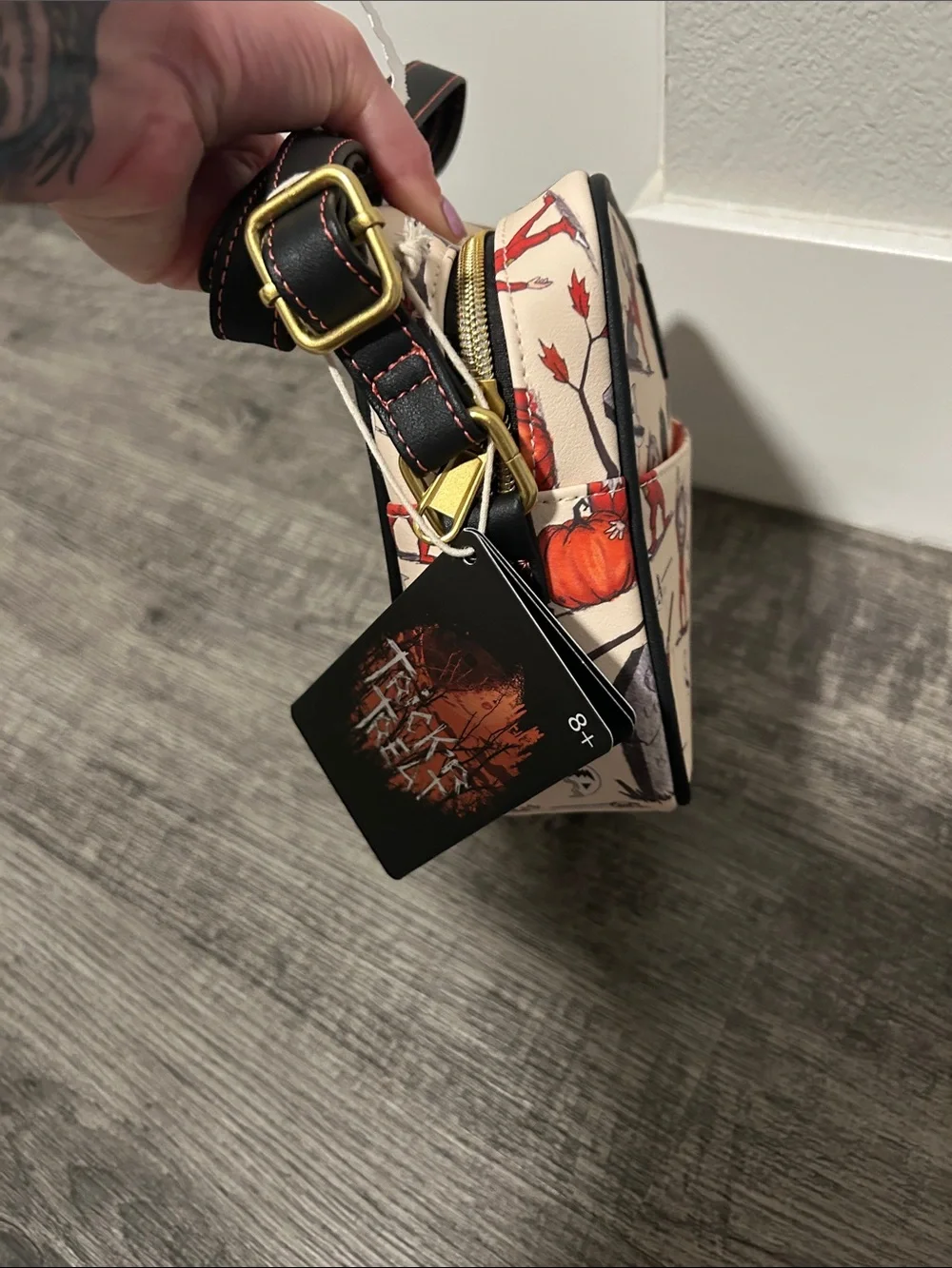 Loungefly Cream Crossbody Bag with Red Halloween Character Print